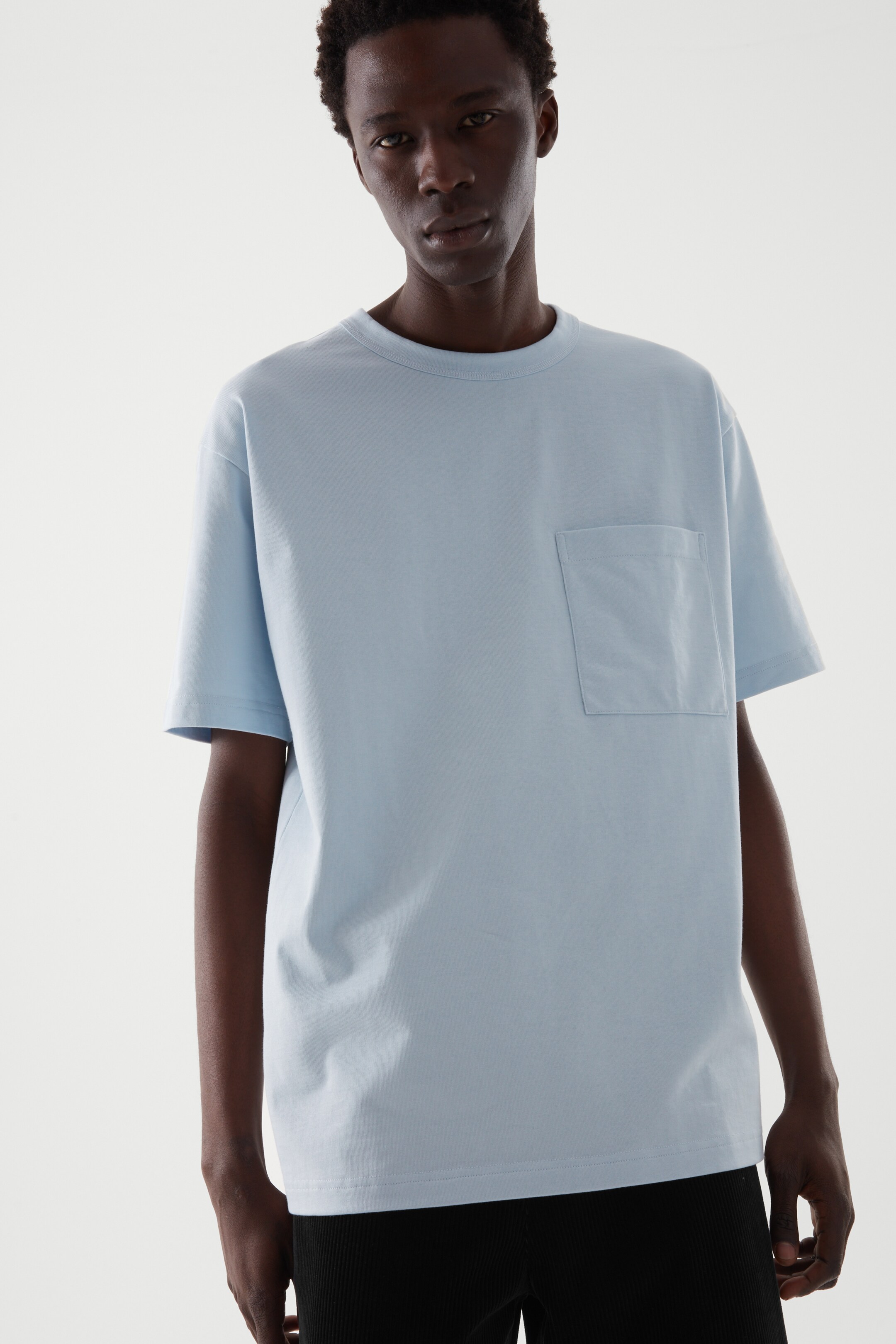 Front image of cos RELAXED-FIT HEAVYWEIGHT T-SHIRT in LIGHT BLUE
