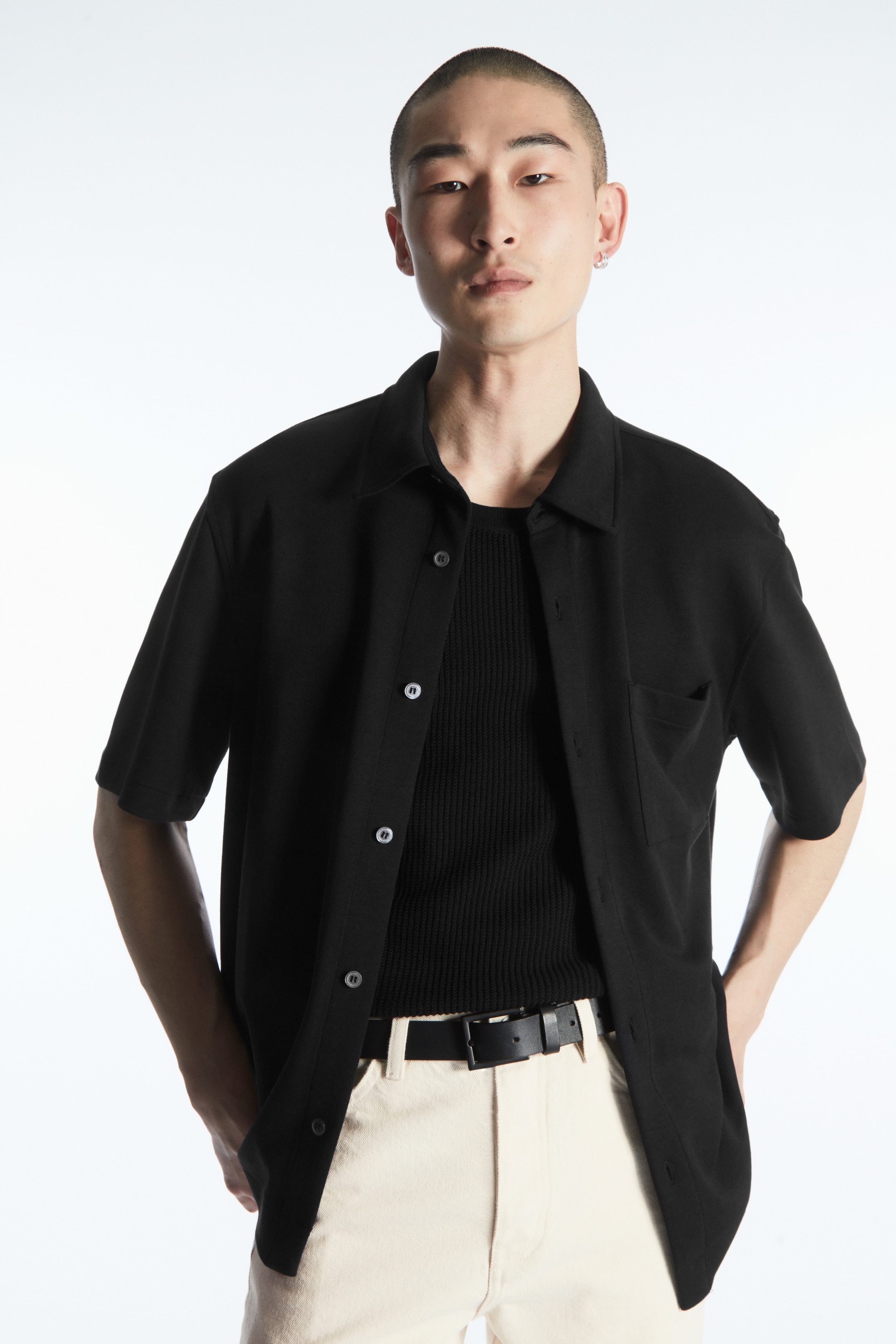 Short-sleeved jersey shirt - BLACK - men | COS AU