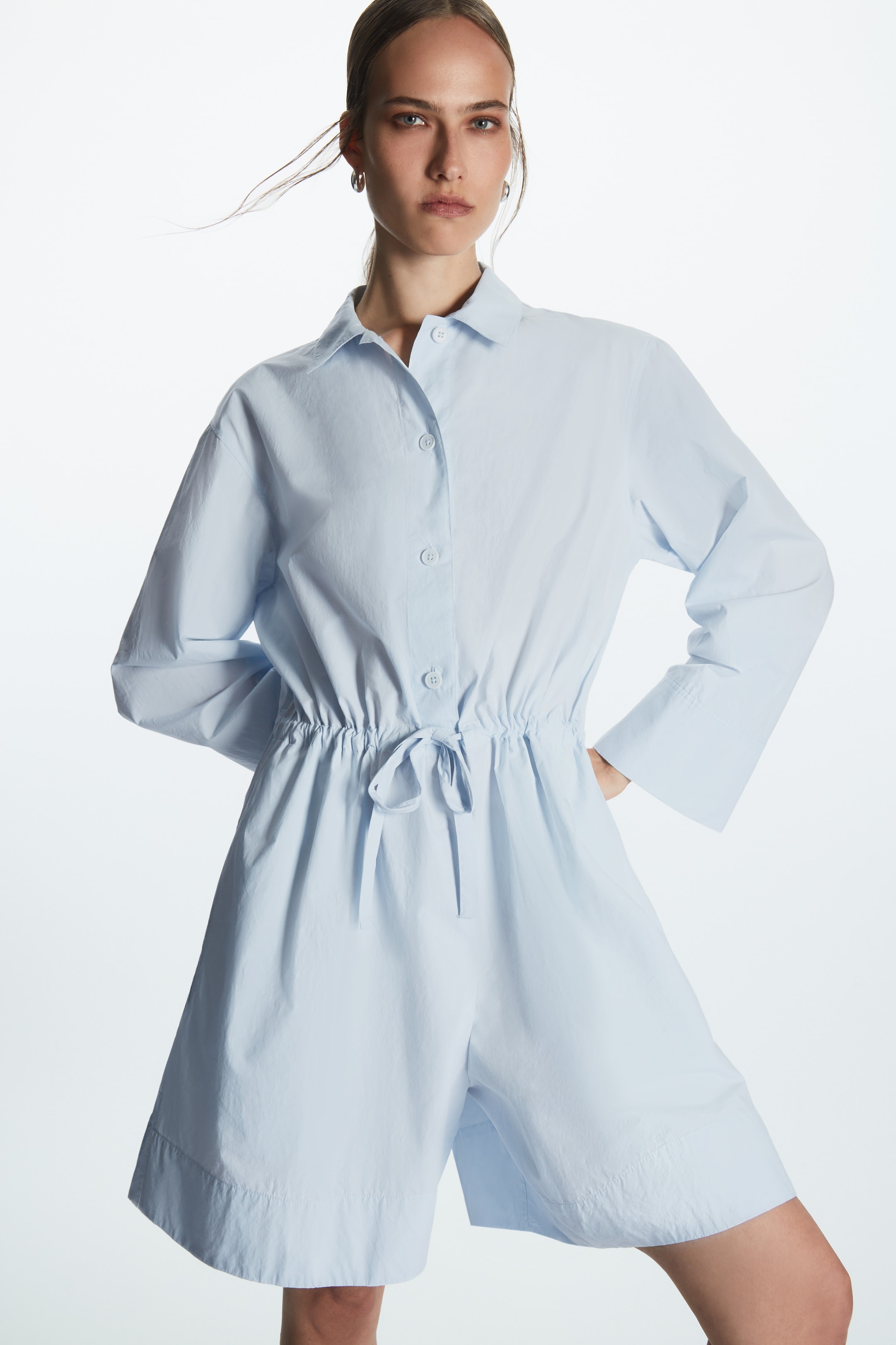 Front image of cos LONG-SLEEVED POPLIN PLAYSUIT in LIGHT BLUE