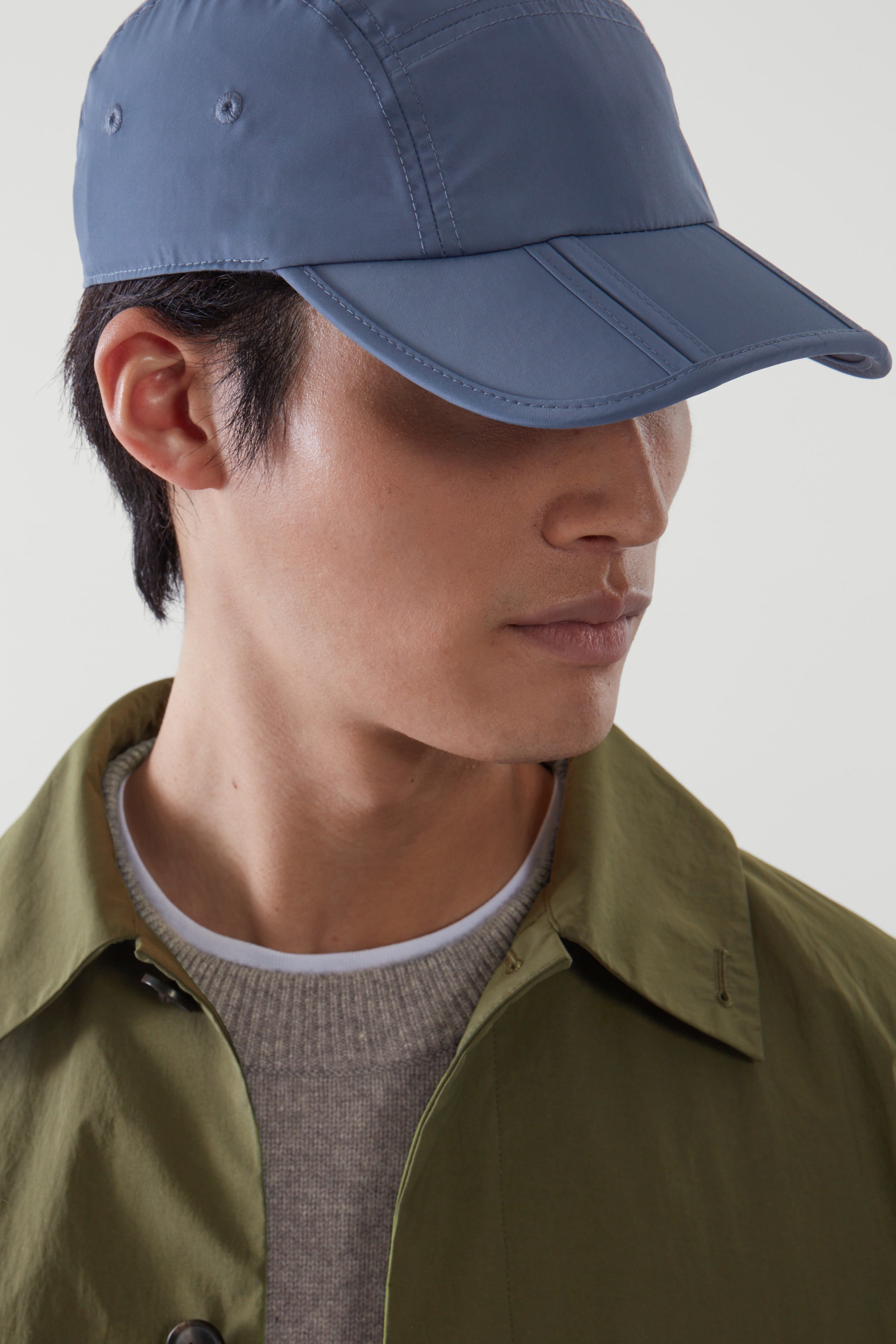 Front image of cos PACKABLE BASEBALL CAP in DUSTY BLUE