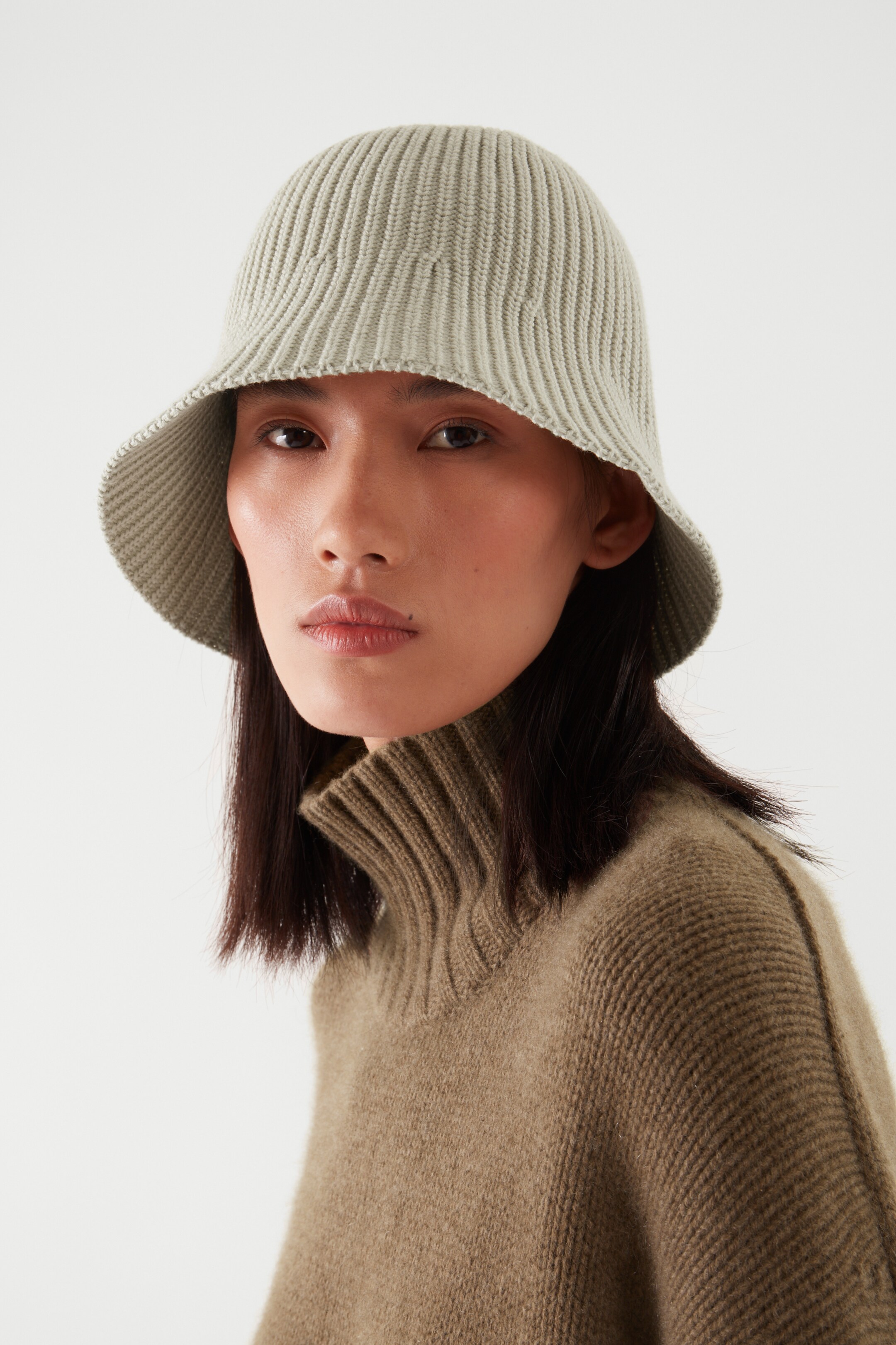 Front image of cos KNITTED BUCKET HAT in beige
