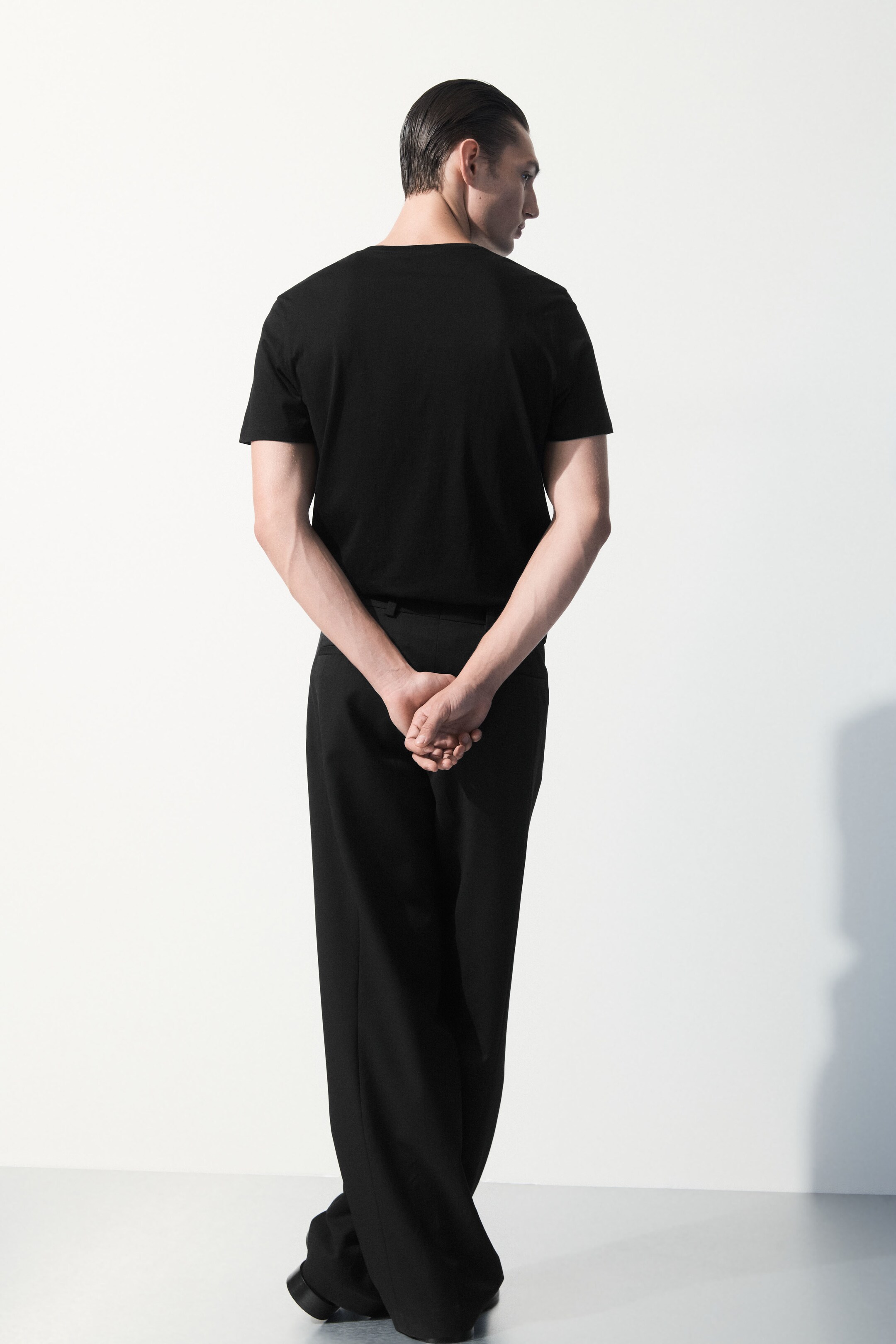 The pleated wool pants - BLACK - men | COS AU