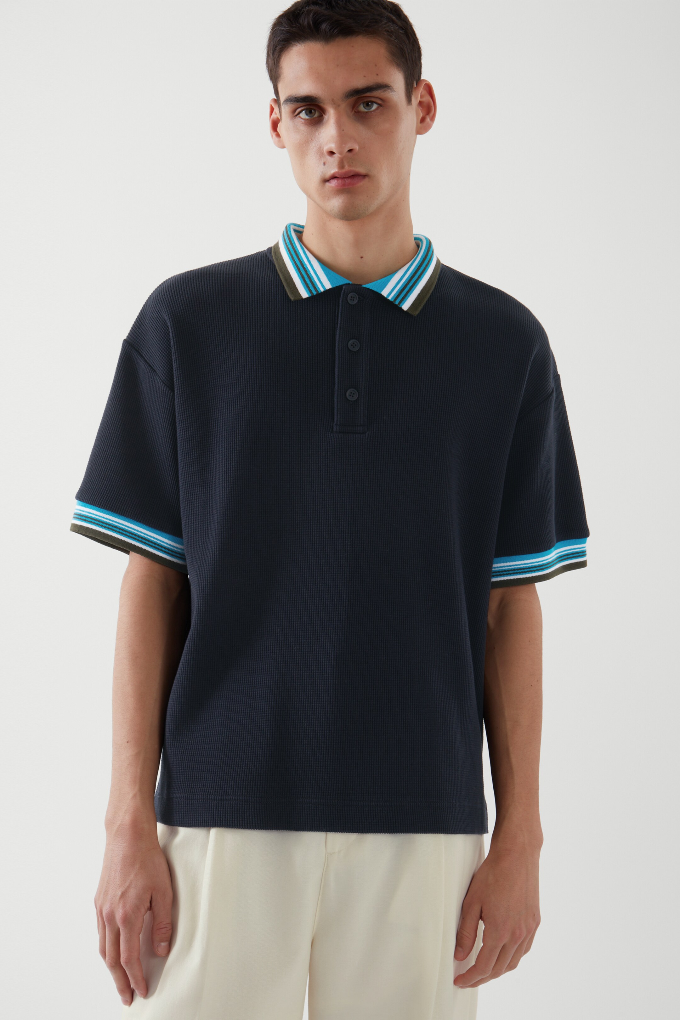 Front image of cos CONTRAST-KNIT POLO SHIRT in NAVY