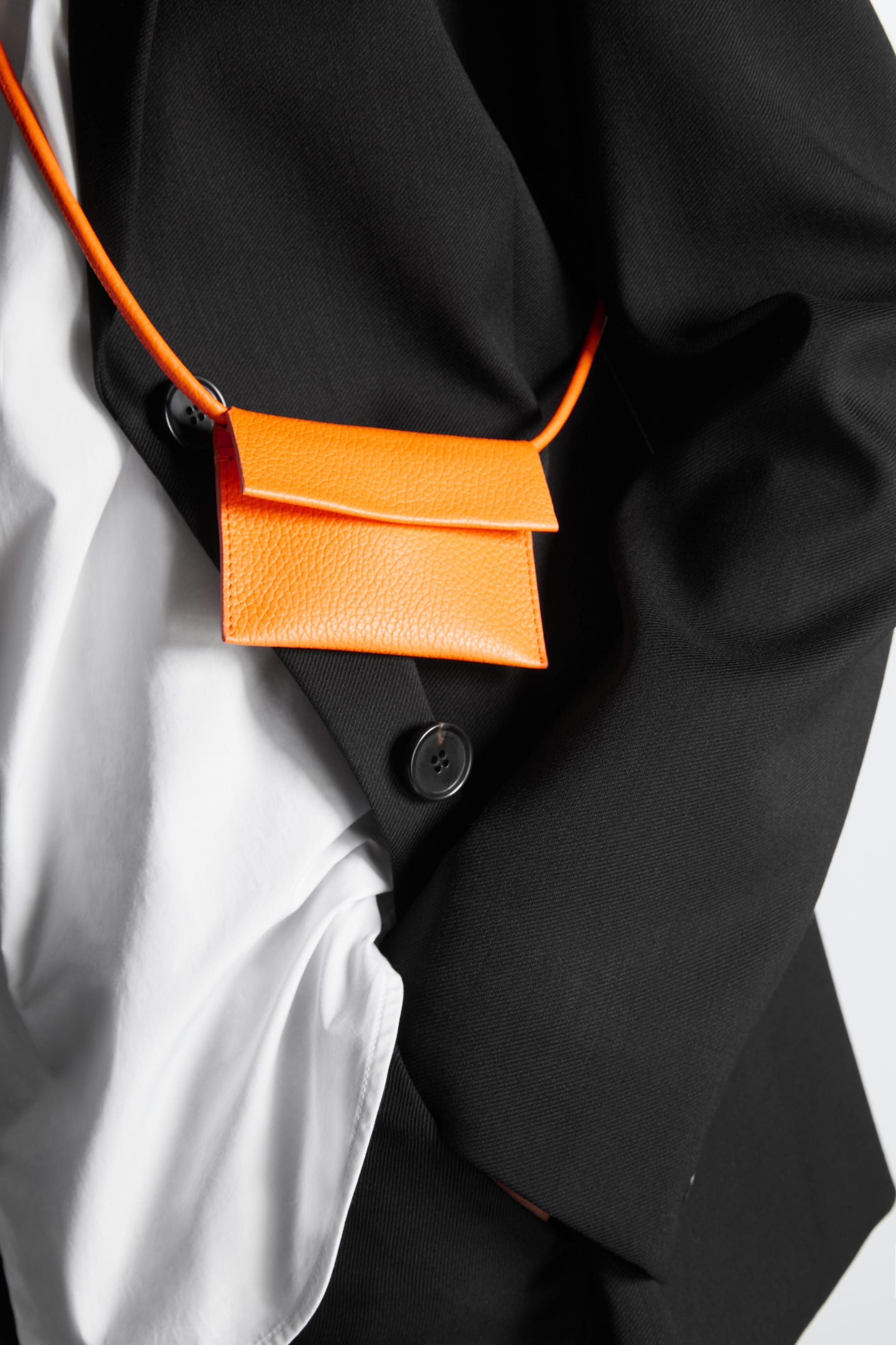 Front image of cos LEATHER CROSSBODY CARDHOLDER in BRIGHT ORANGE