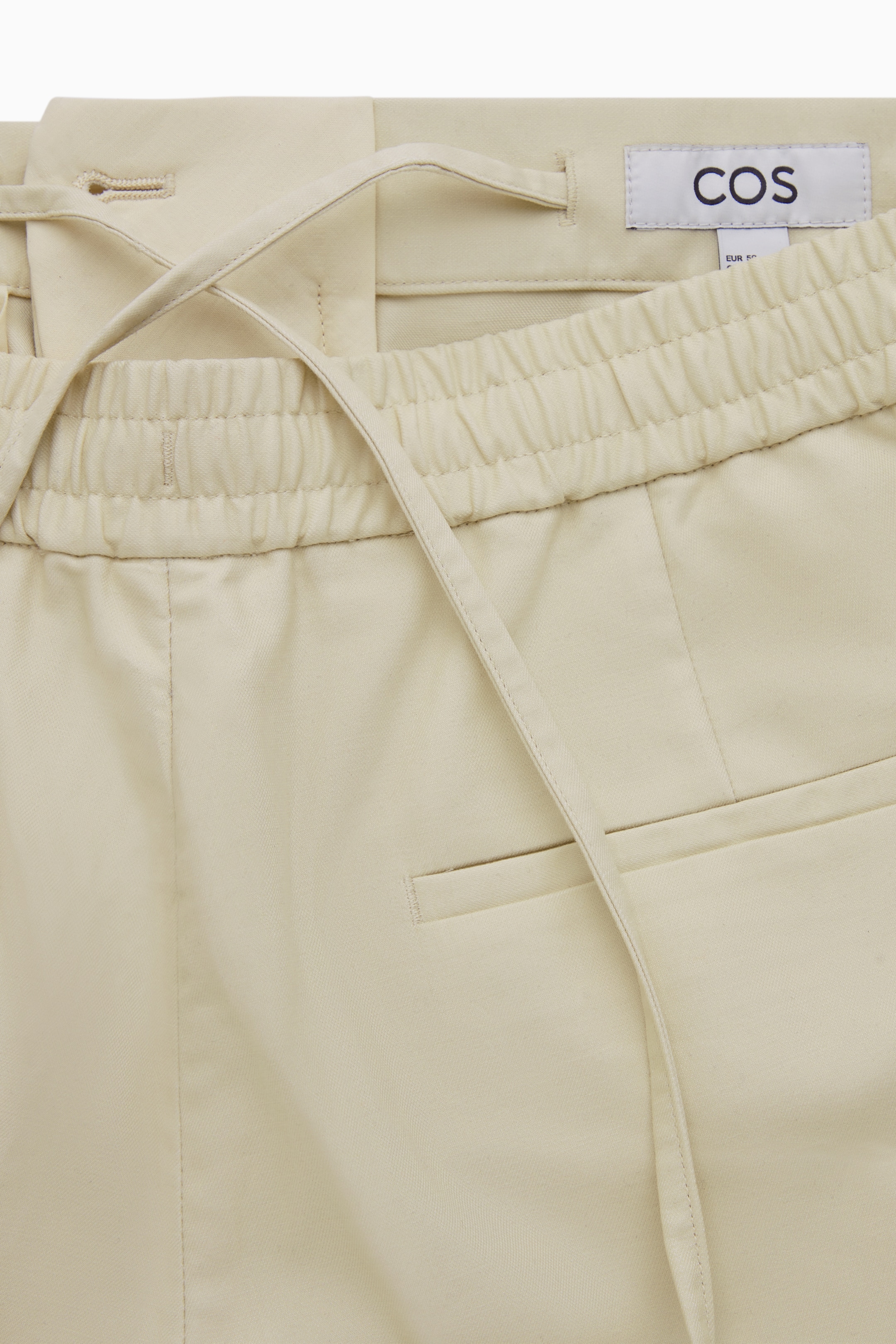 Regular-fit pleated twill pants - OFF-WHITE - men | COS AU