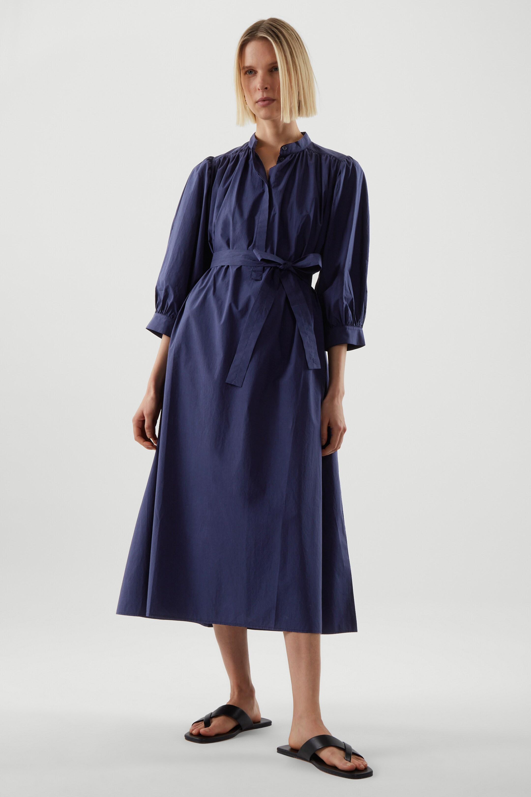Front image of cos PUFF-SLEEVE BELTED DRESS in NAVY