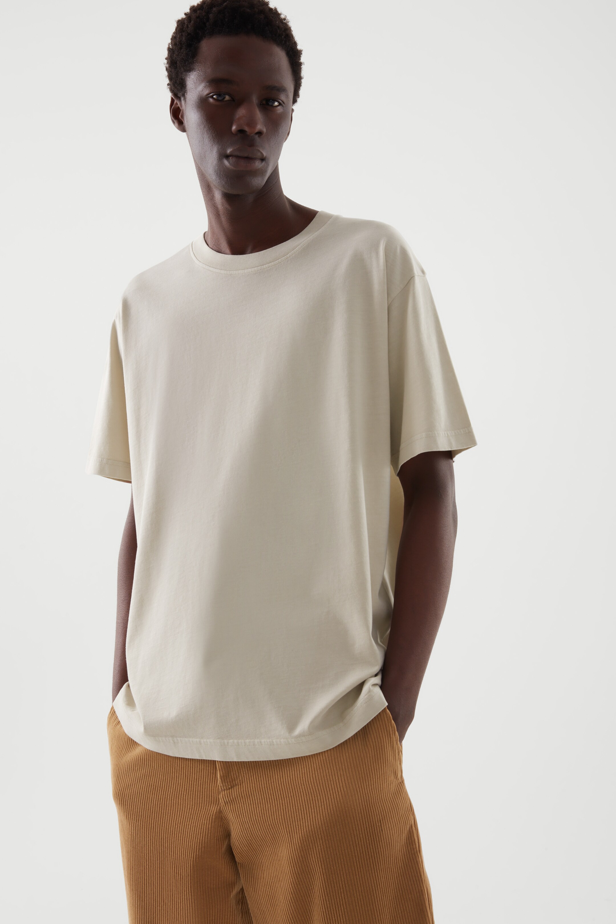 Front image of cos RELAXED-FIT MID-WEIGHT T-SHIRT in LIGHT BEIGE