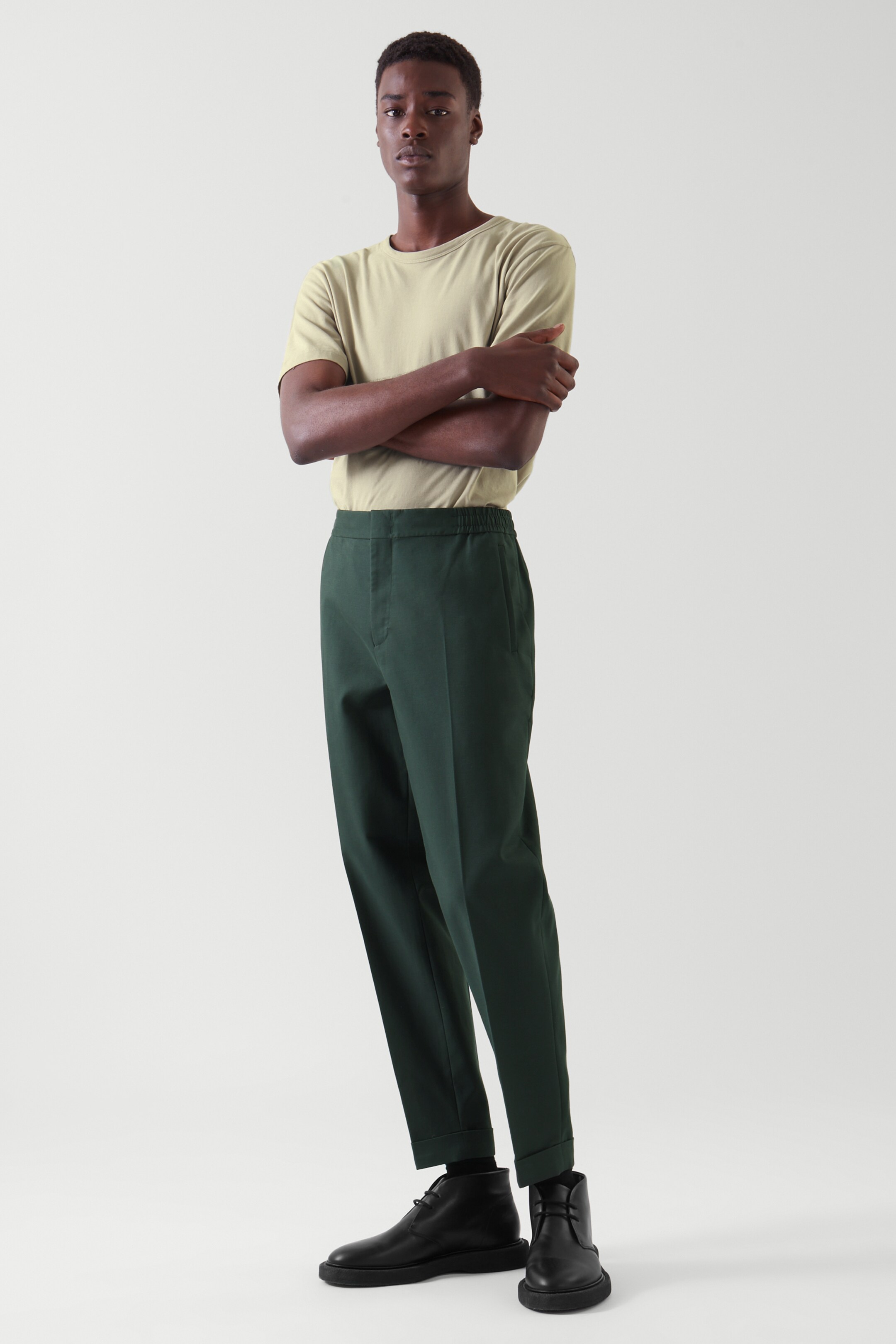 Front image of cos REGULAR-FIT PLEATED PANTS in DARK GREEN