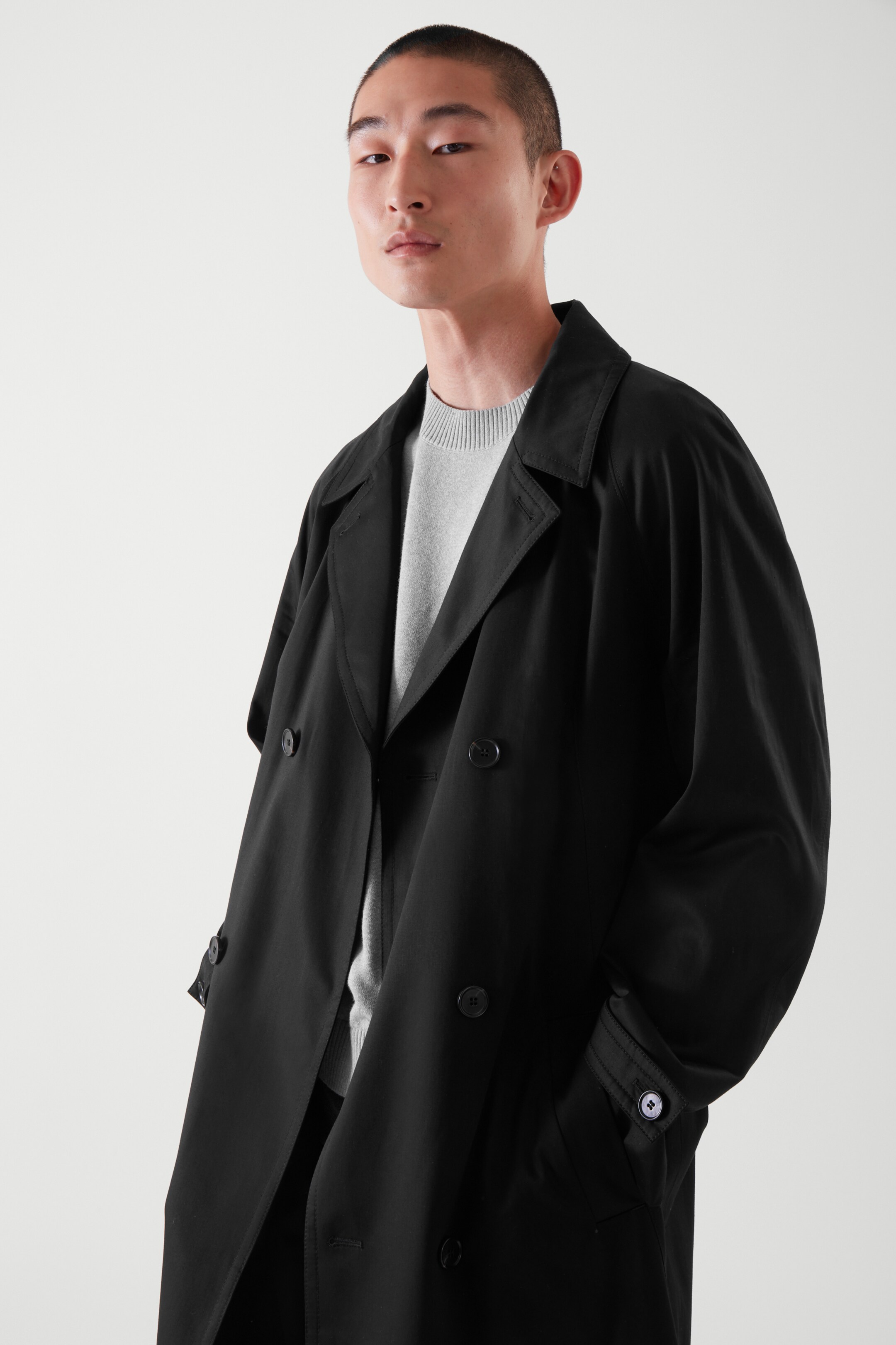 Front image of cos BELTED TRENCH COAT in black