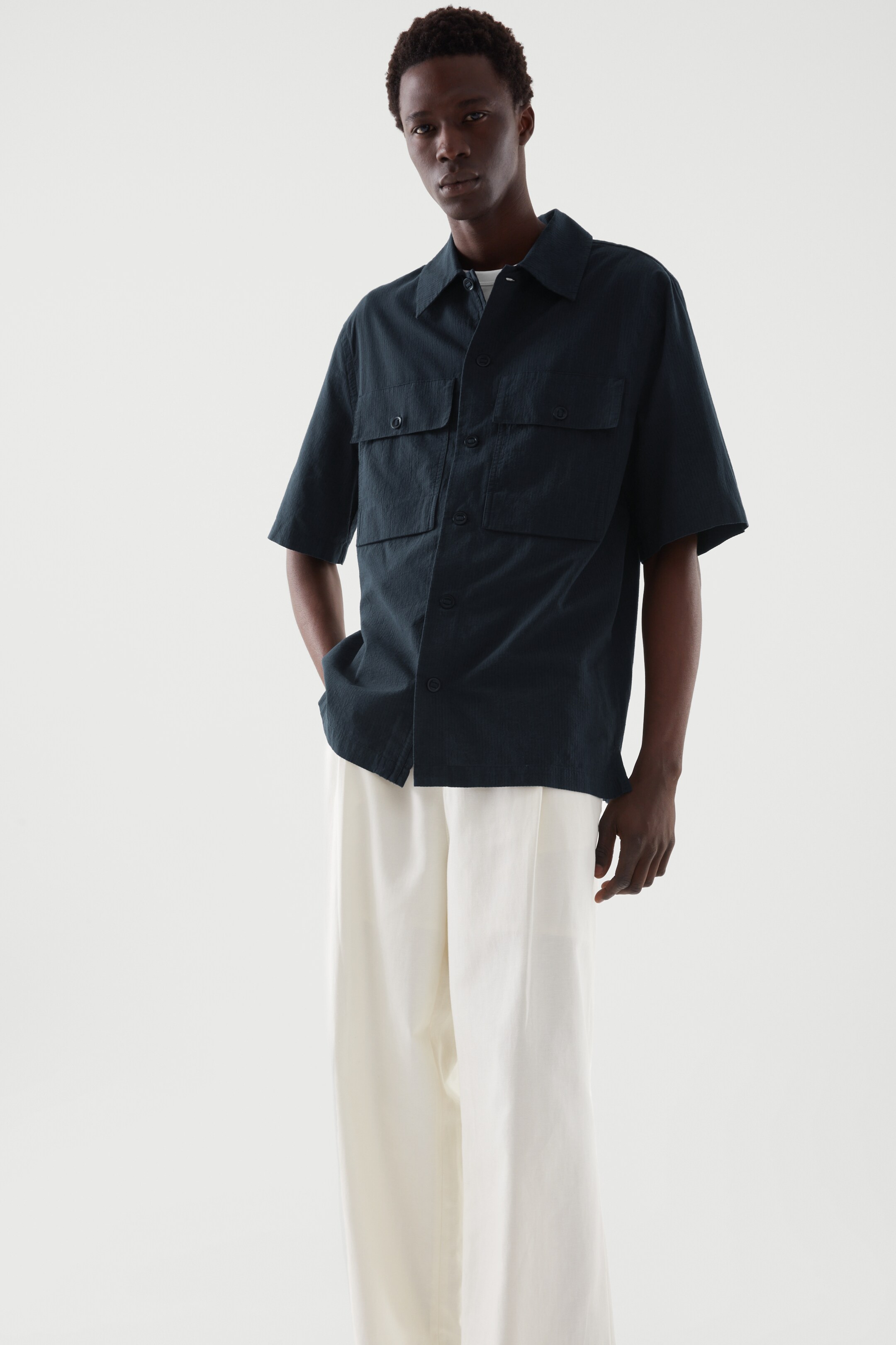 Front image of cos RELAXED-FIT SEERSUCKER SHIRT in NAVY