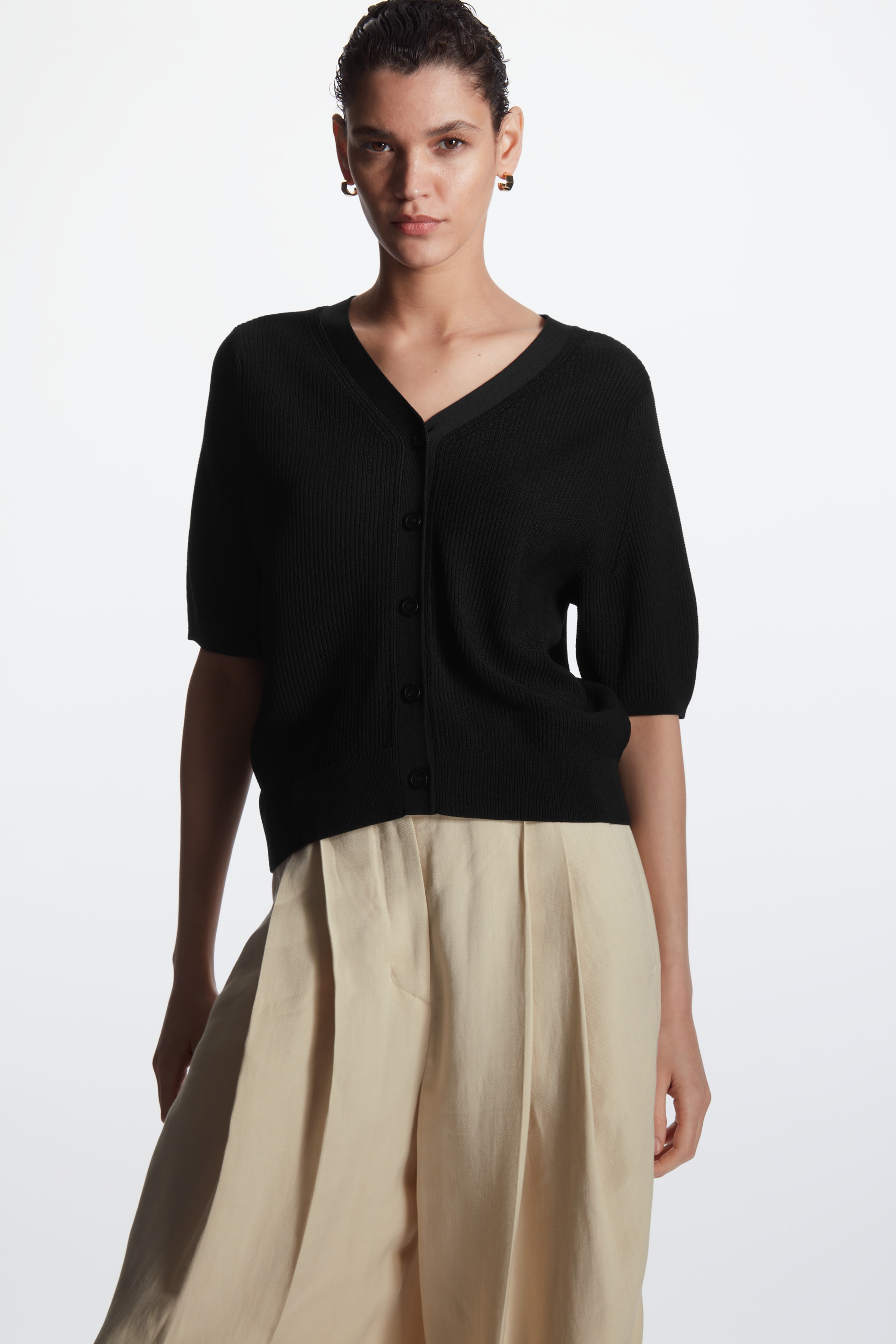 Front image of cos SHORT-SLEEVE CARDIGAN in BLACK