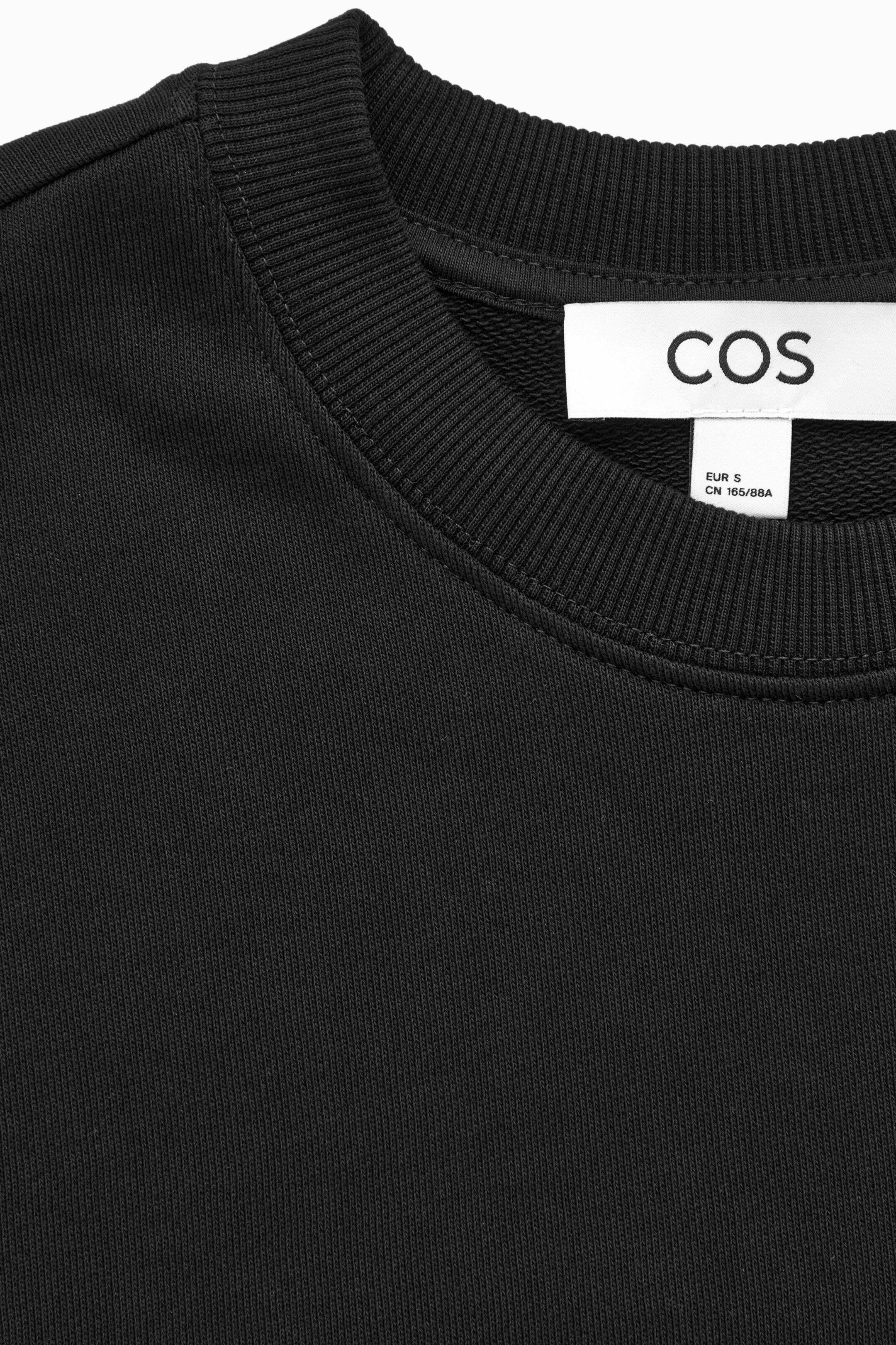 Relaxed-fit jersey sweatshirt - BLACK - women | COS AU