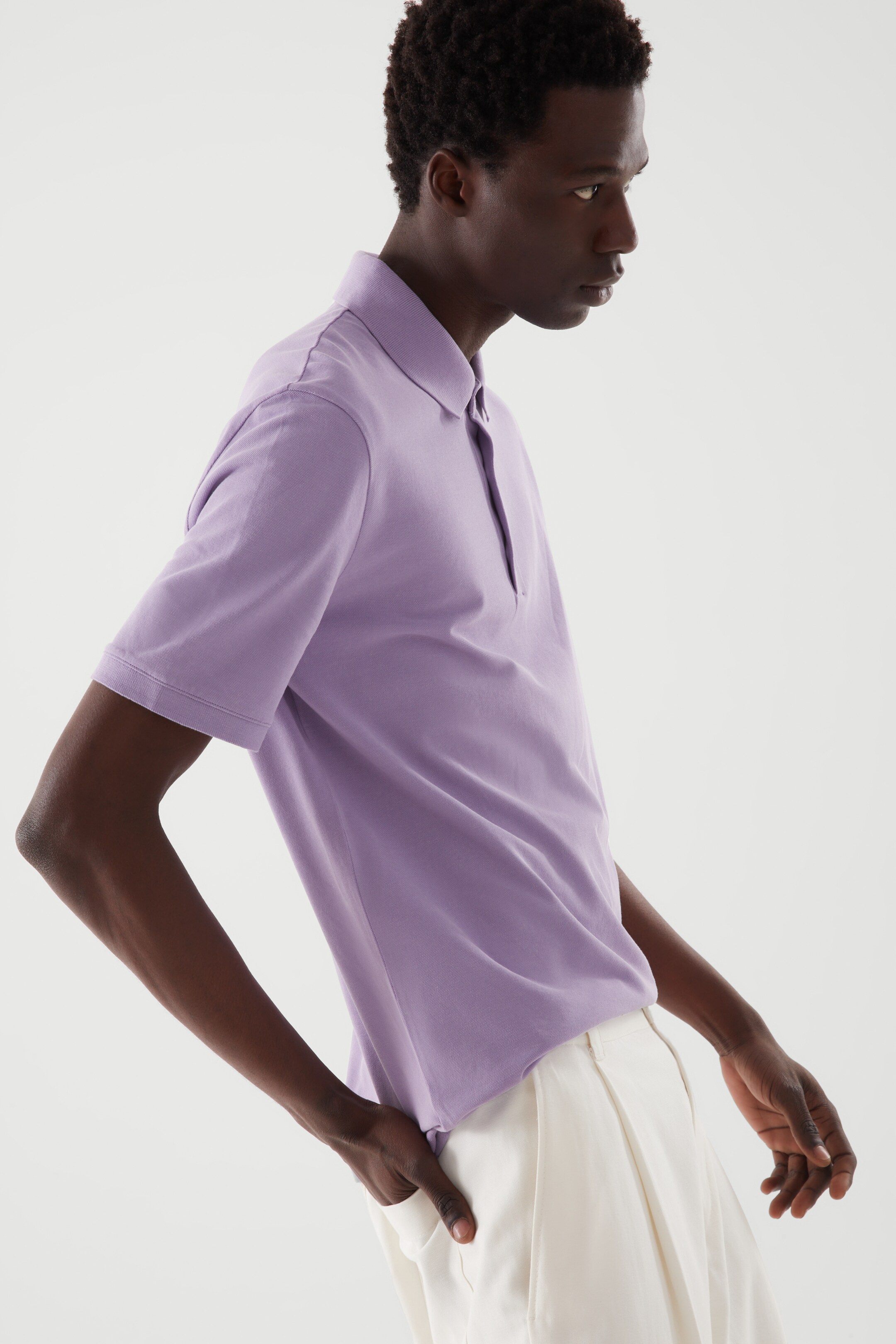 Left image of cos REGULAR-FIT PIQUÉ POLO SHIRT in LILAC