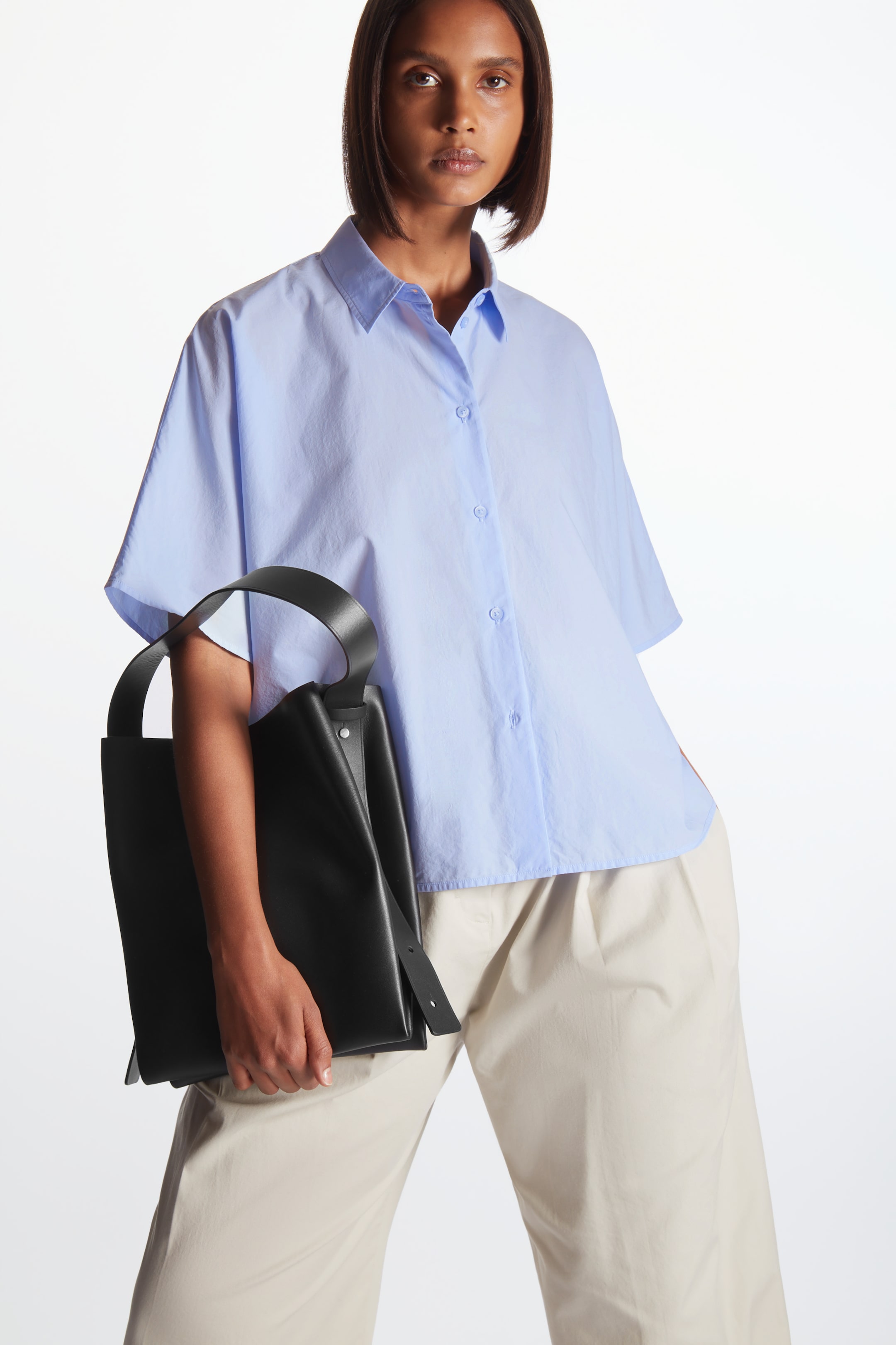 Front image of cos BOXY SHORT-SLEEVE SHIRT in LIGHT BLUE