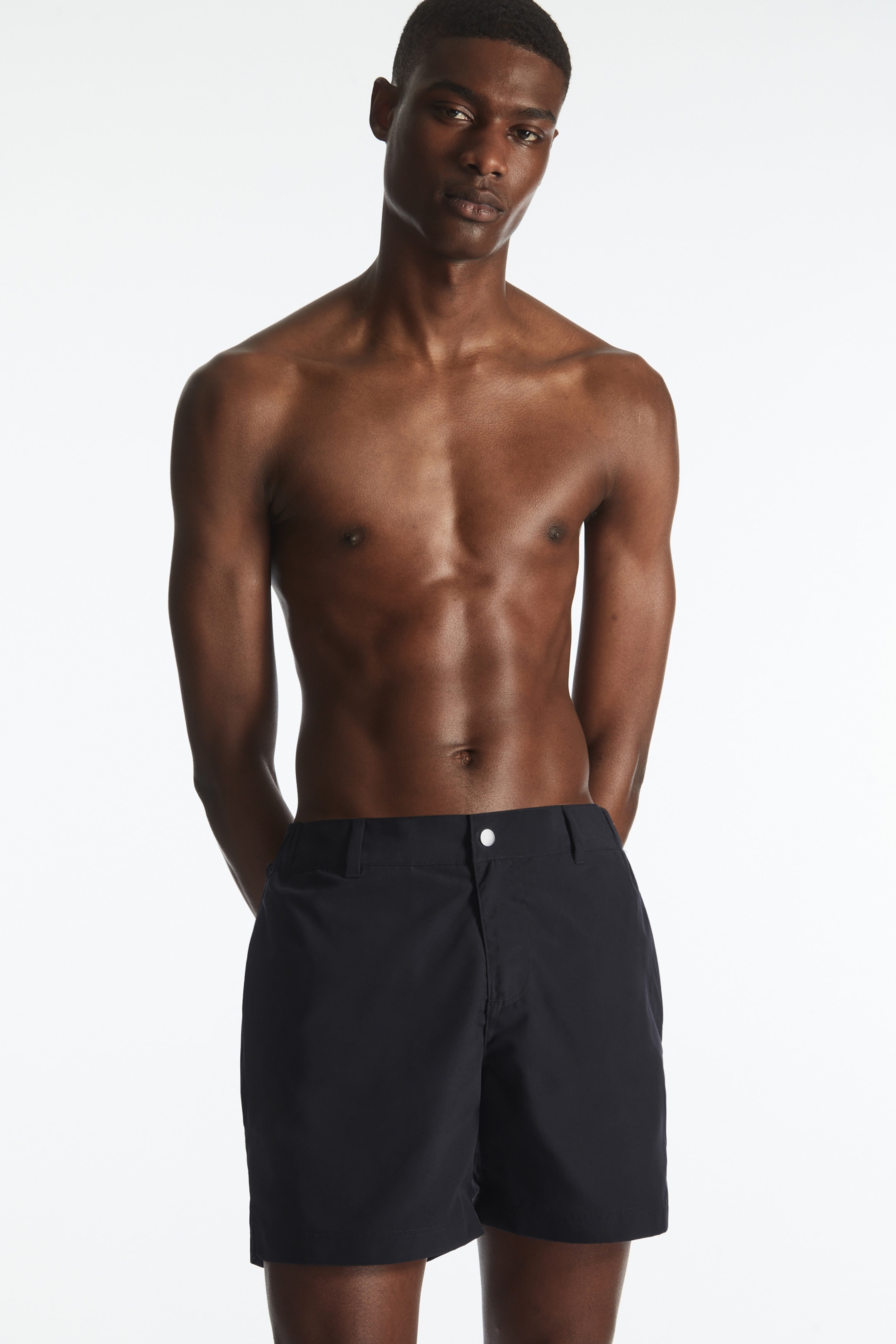 Tailored swim shorts - DARK NAVY - men | COS AU