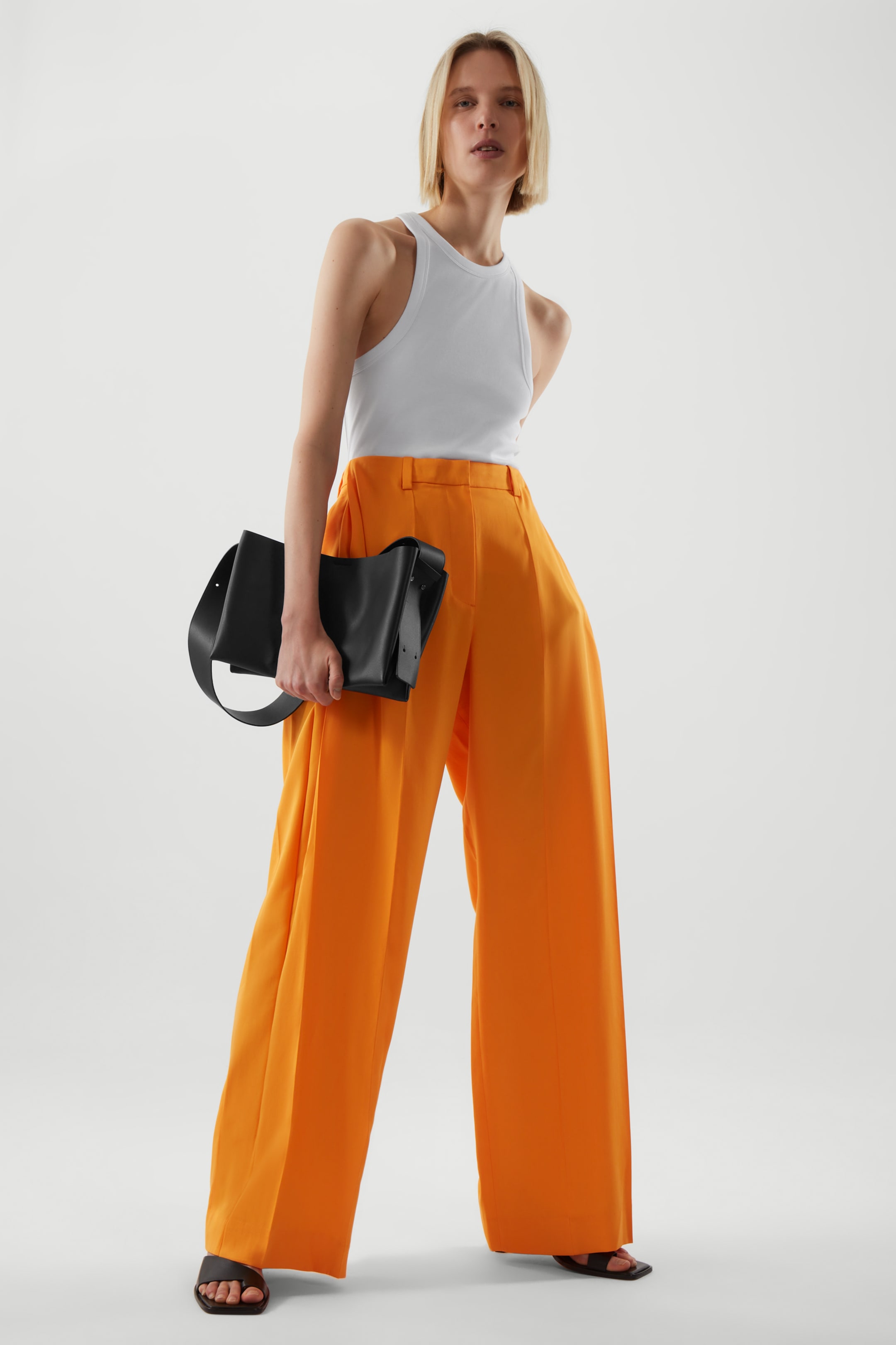 Front image of cos WIDE-LEG TAILORED PANTS in BRIGHT ORANGE