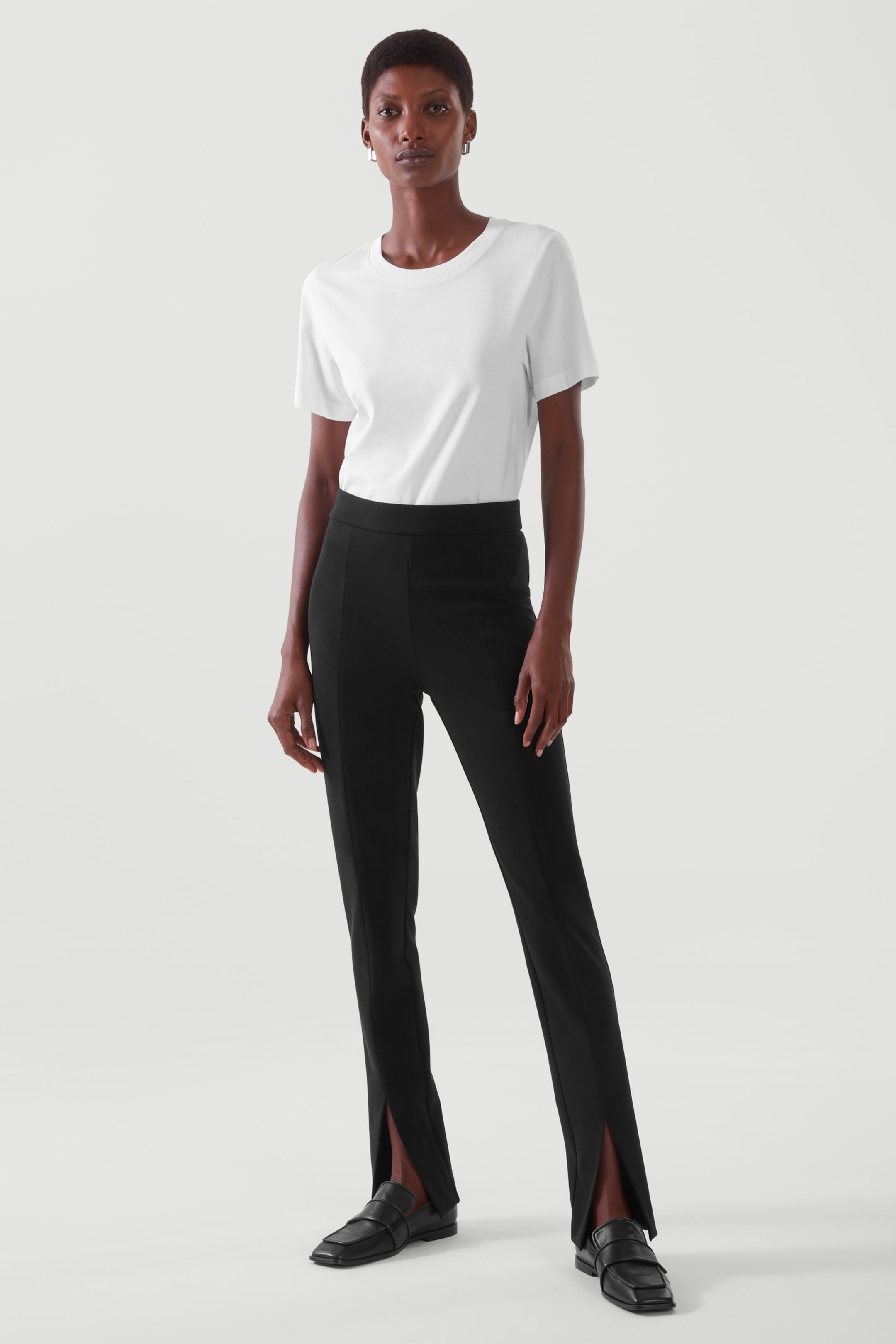Front image of cos SLIM-FIT PANTS in BLACK