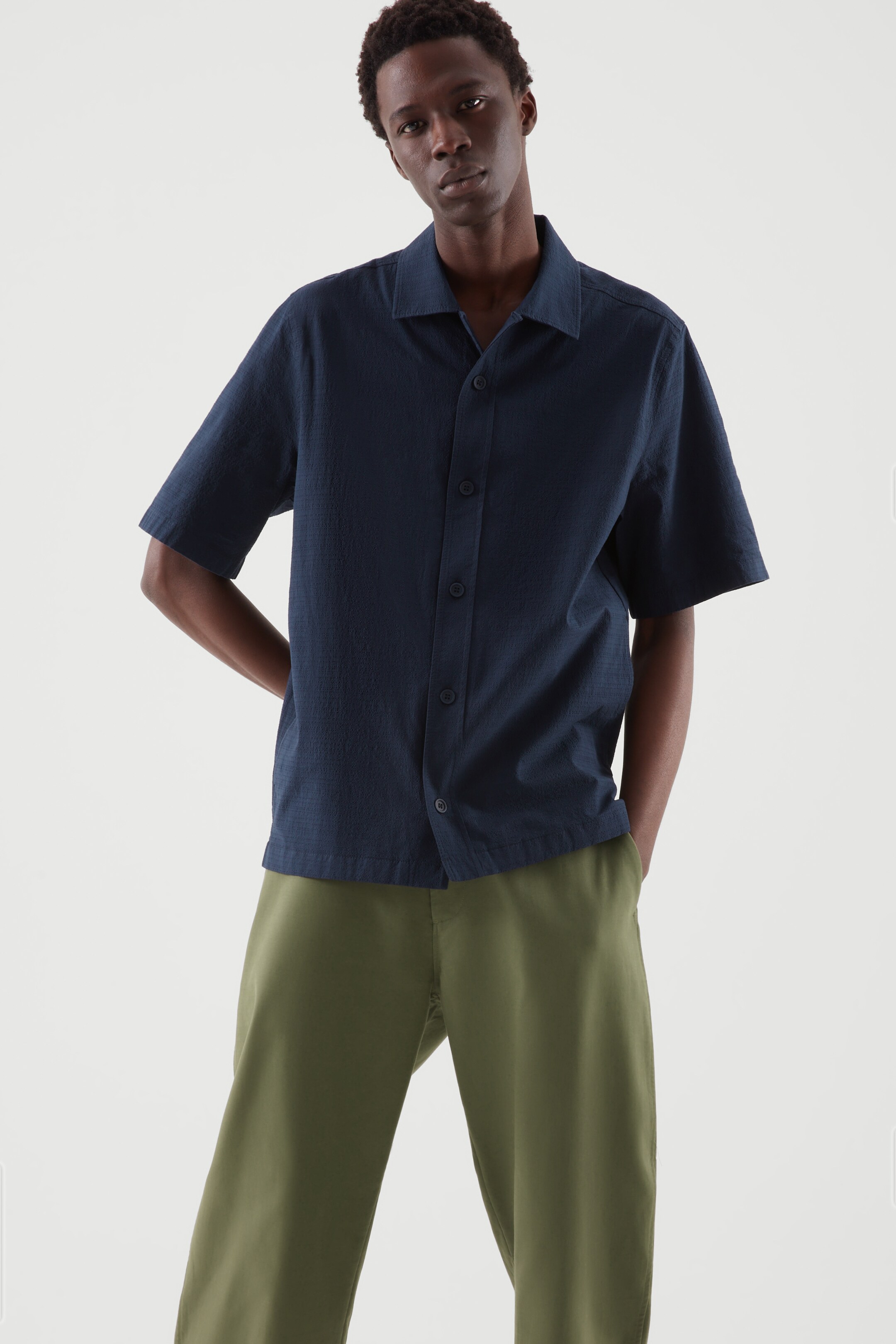 Front image of cos RELAXED-FIT TEXTURED SHIRT in NAVY
